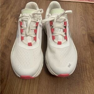 On Running White and Pink Sneakers